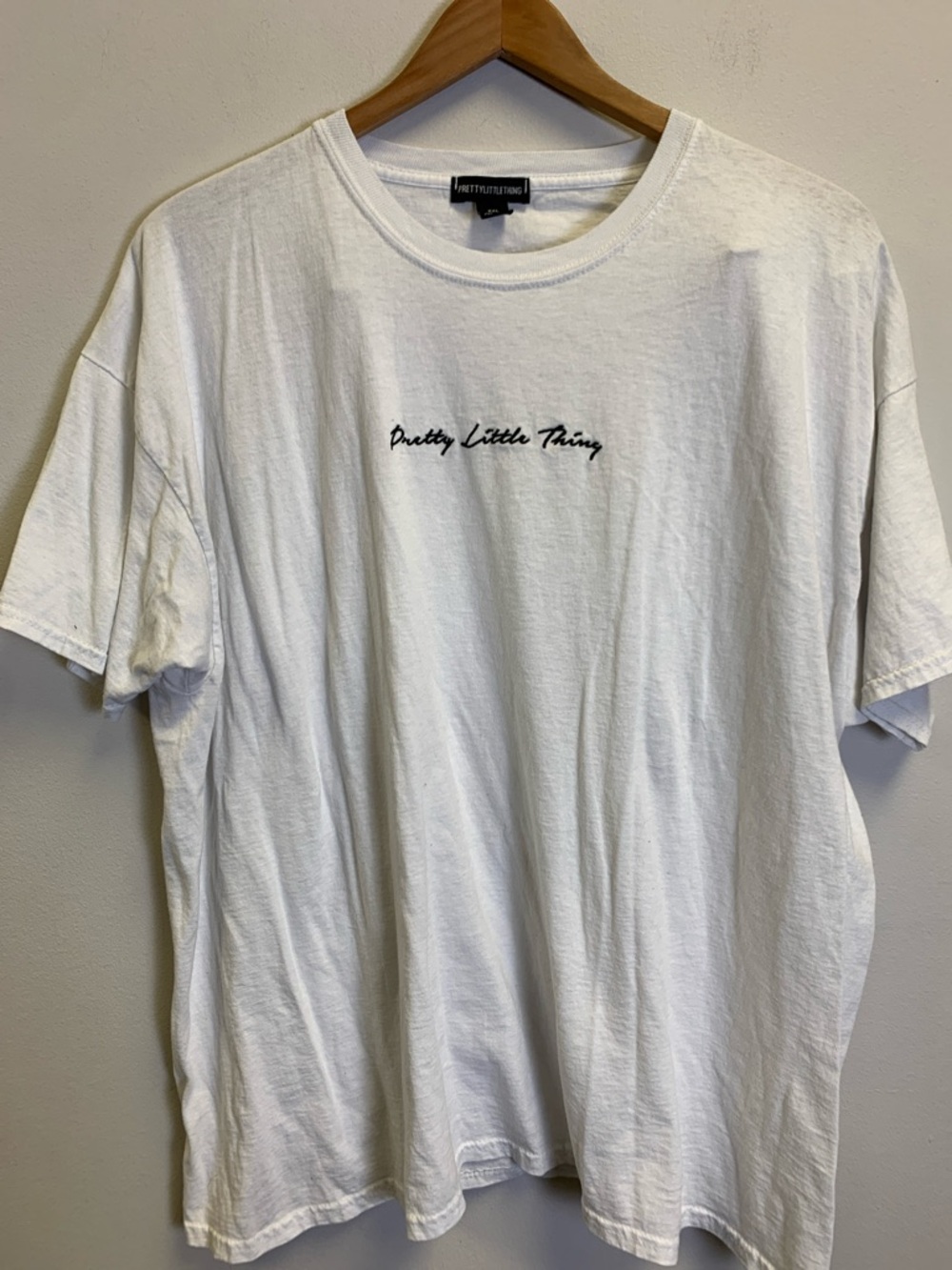 PrettyLittleThing White Crewneck Tee with Black Script. 3 bundled shirts